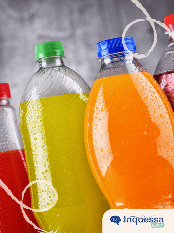Plastic bottles filled with brightly colored soft drinks