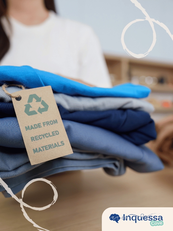 Folded clothing with a tag stating that it is made from recycled materials