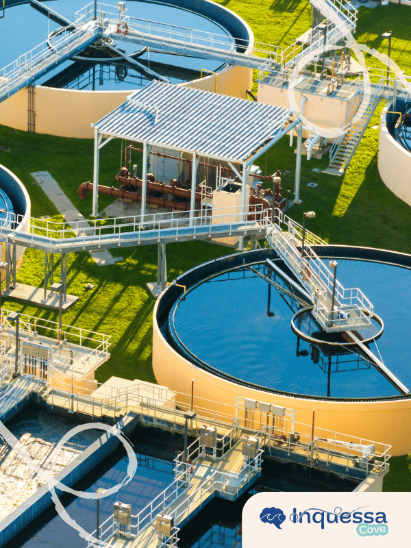 Large circular tanks and walkways at a water treatment facility