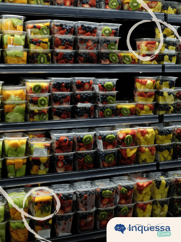 Large compressed bales of mixed plastic waste at a recycling facility
